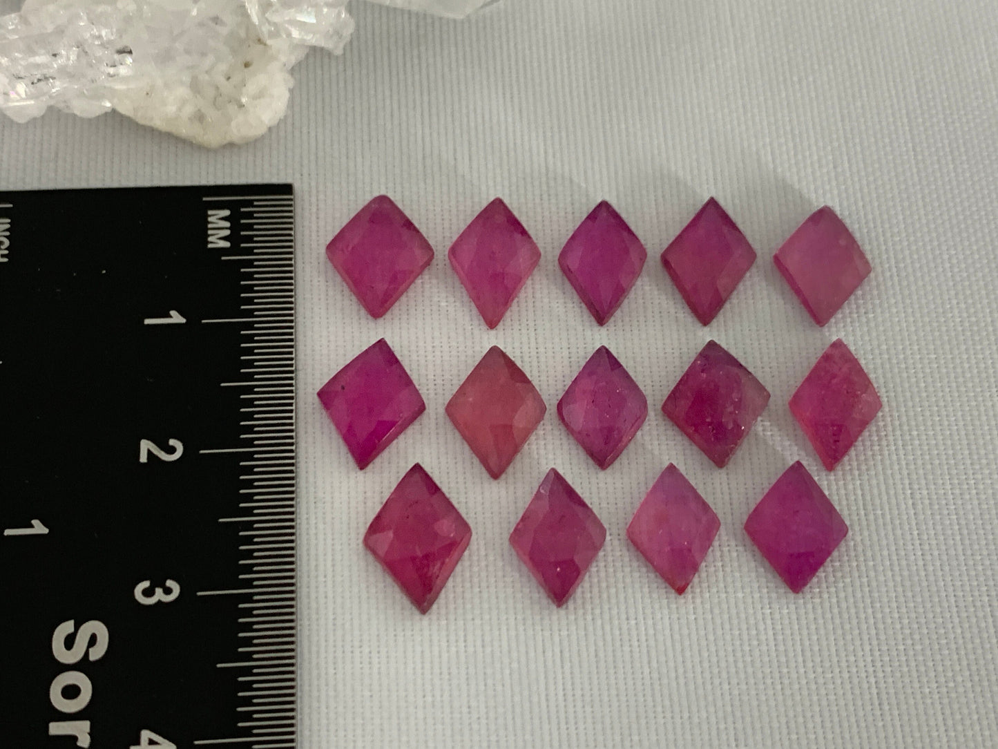 Faceted 10-11mm Thailand Pink Sapphire cabochon