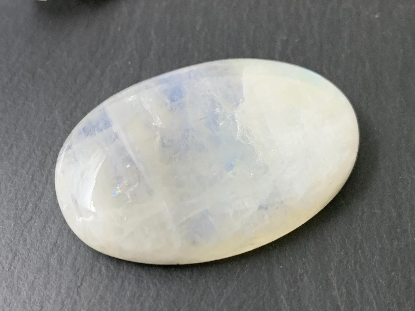 Rainbow Moonstone oval 41x29x8mm cabochon