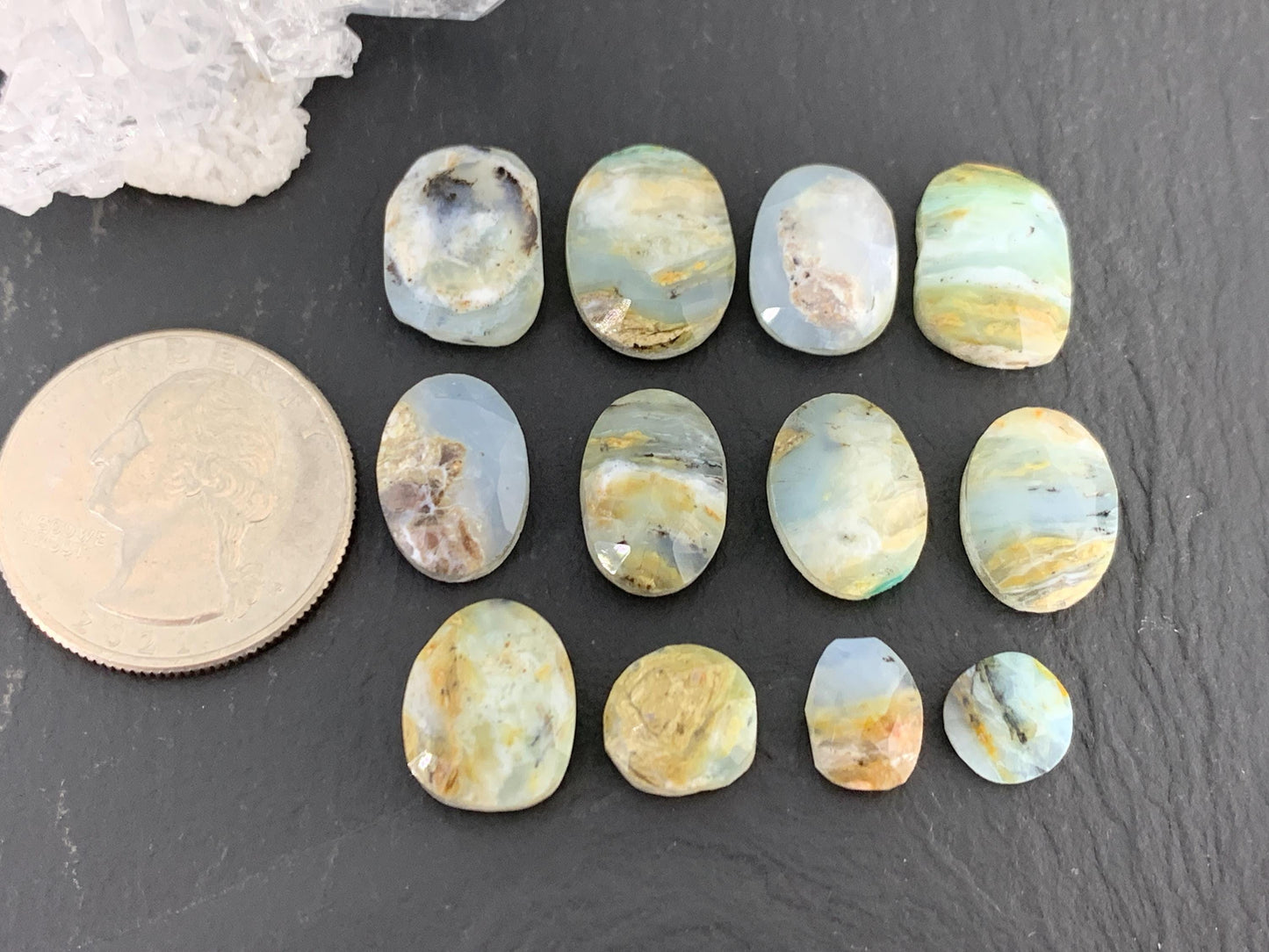 Faceted Peruvian Opal 8-14mm long cabochon.
