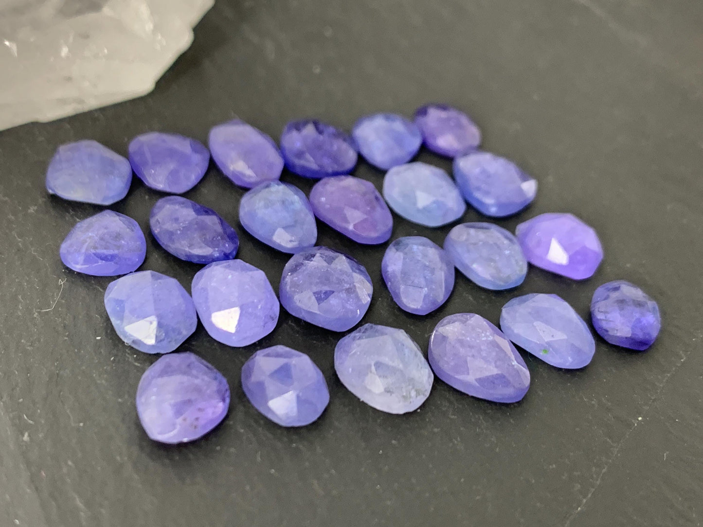 Discounted Damaged Faceted Tanzanite 8-10mm long cabochon