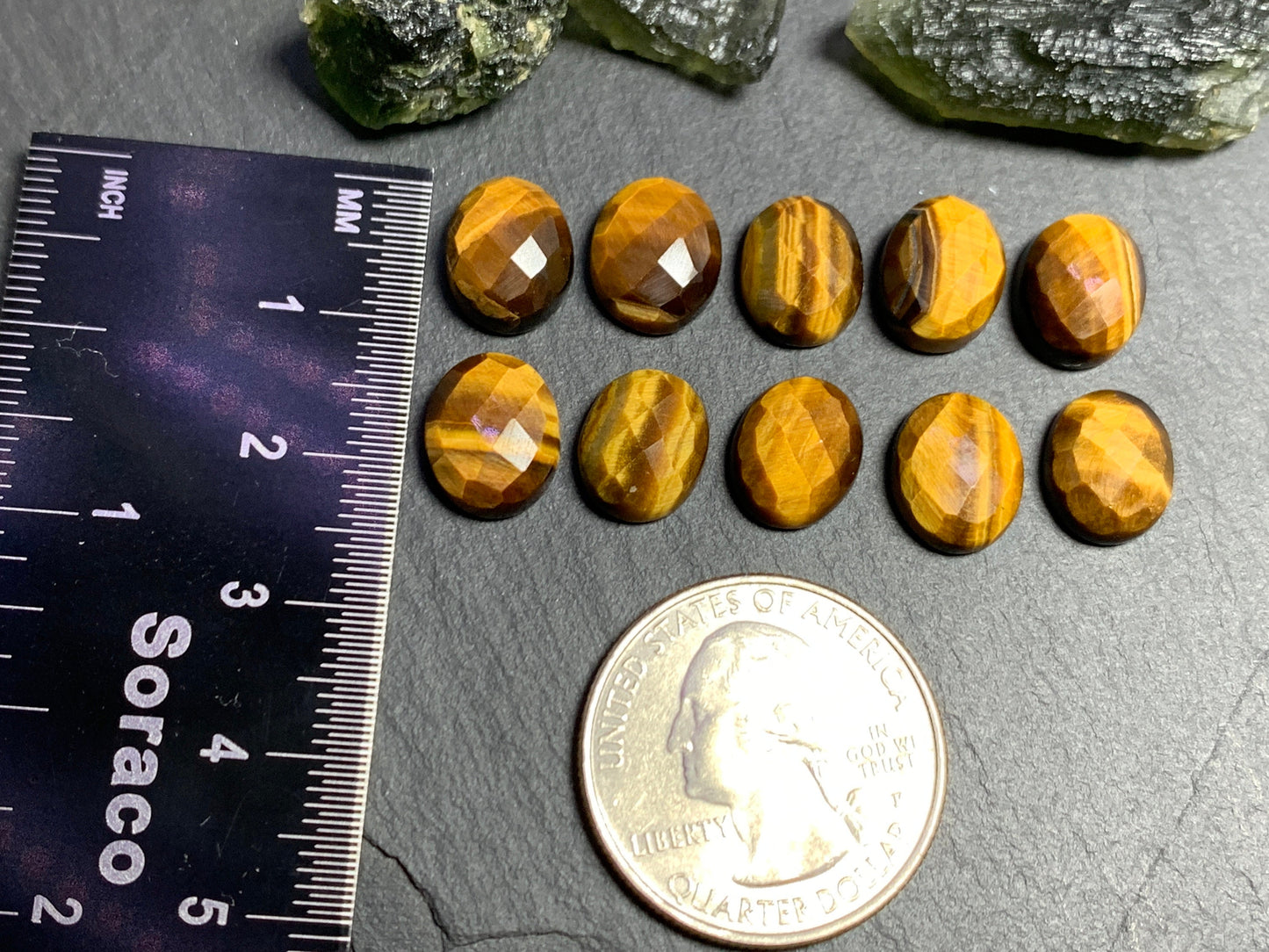 Faceted Tiger Eye 10-11mm long cabochon