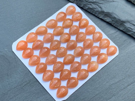 GoldSand Sunstone pear 8x10mm cabochon