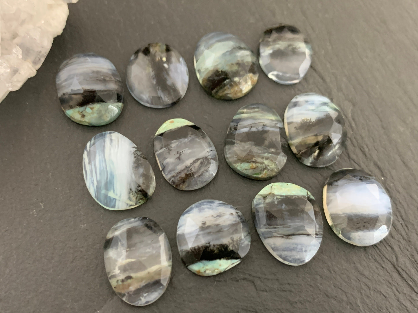 Faceted Peruvian Opal 13-15mm long cabochon
