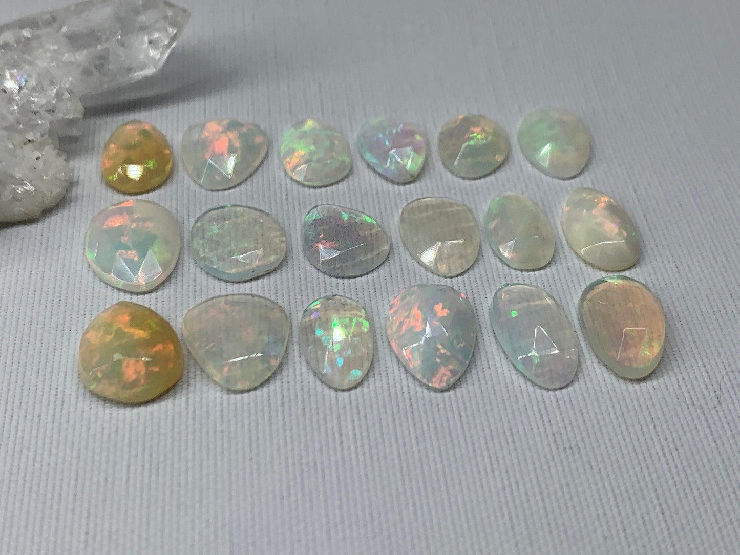 Faceted Ethiopian Opal 10-12mm long cabochon