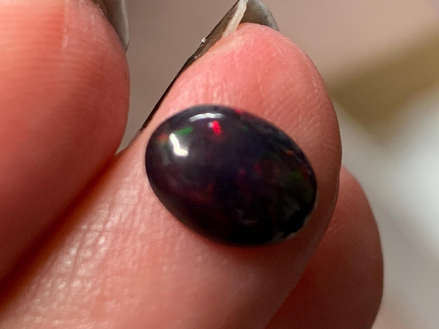 Natural Ethiopian Black Opal 7x9x3mm cabochon