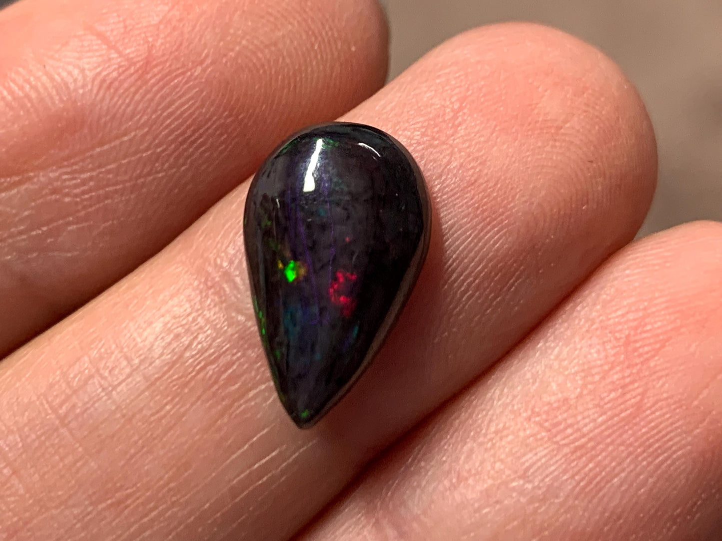 Black Ethiopian Opal pear 9x14x3mm cabochon
