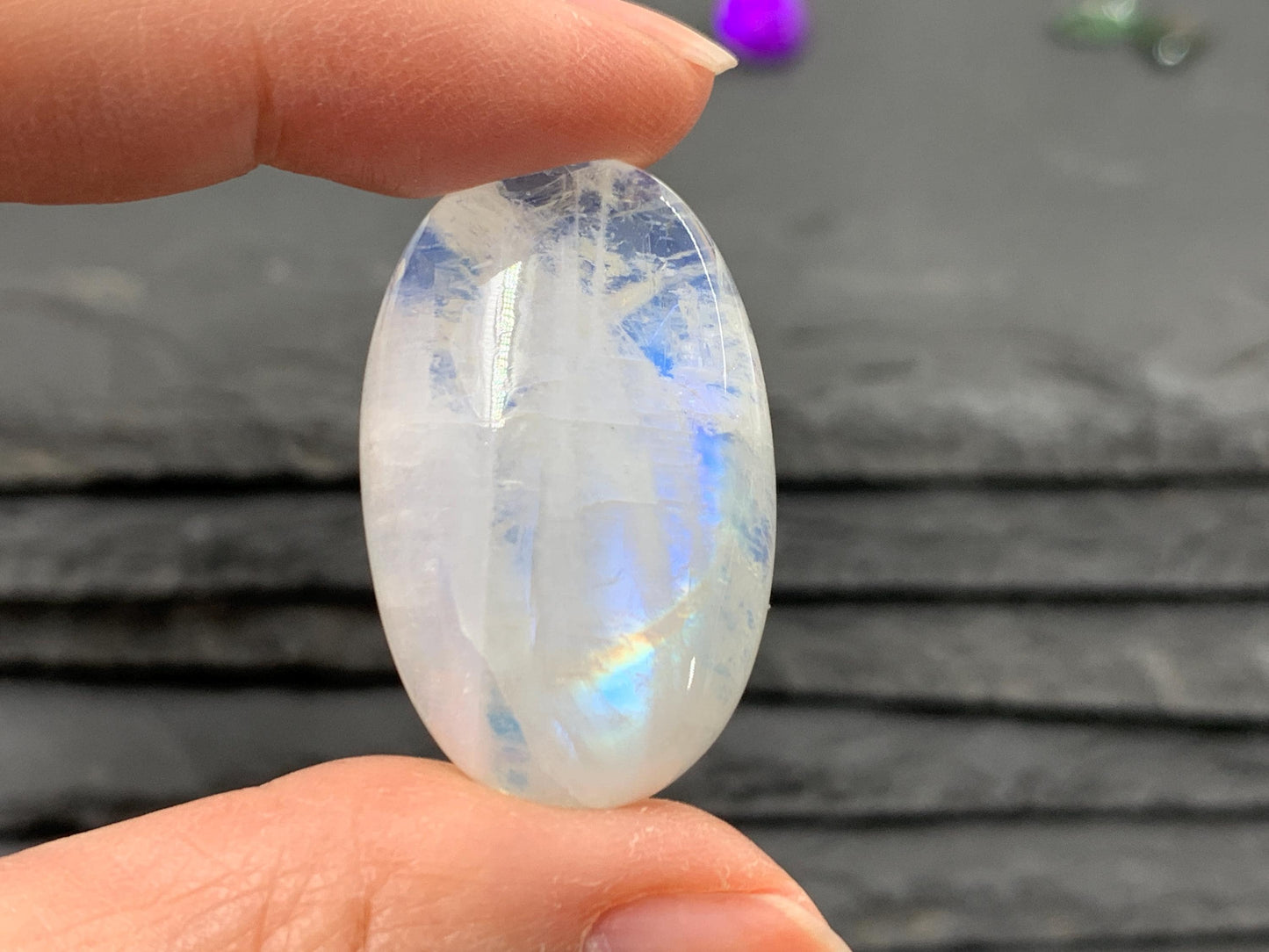 Rainbow Moonstone oval 33x21x9mm cabochon