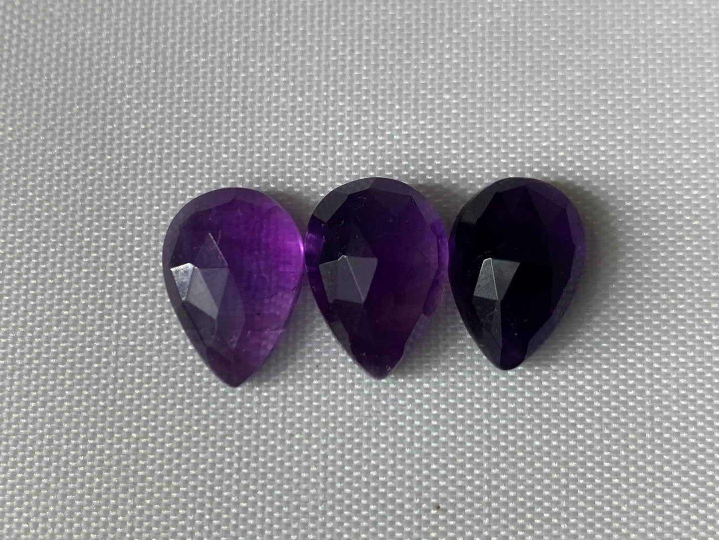 Faceted Amethyst pear 10x14mm cabochon