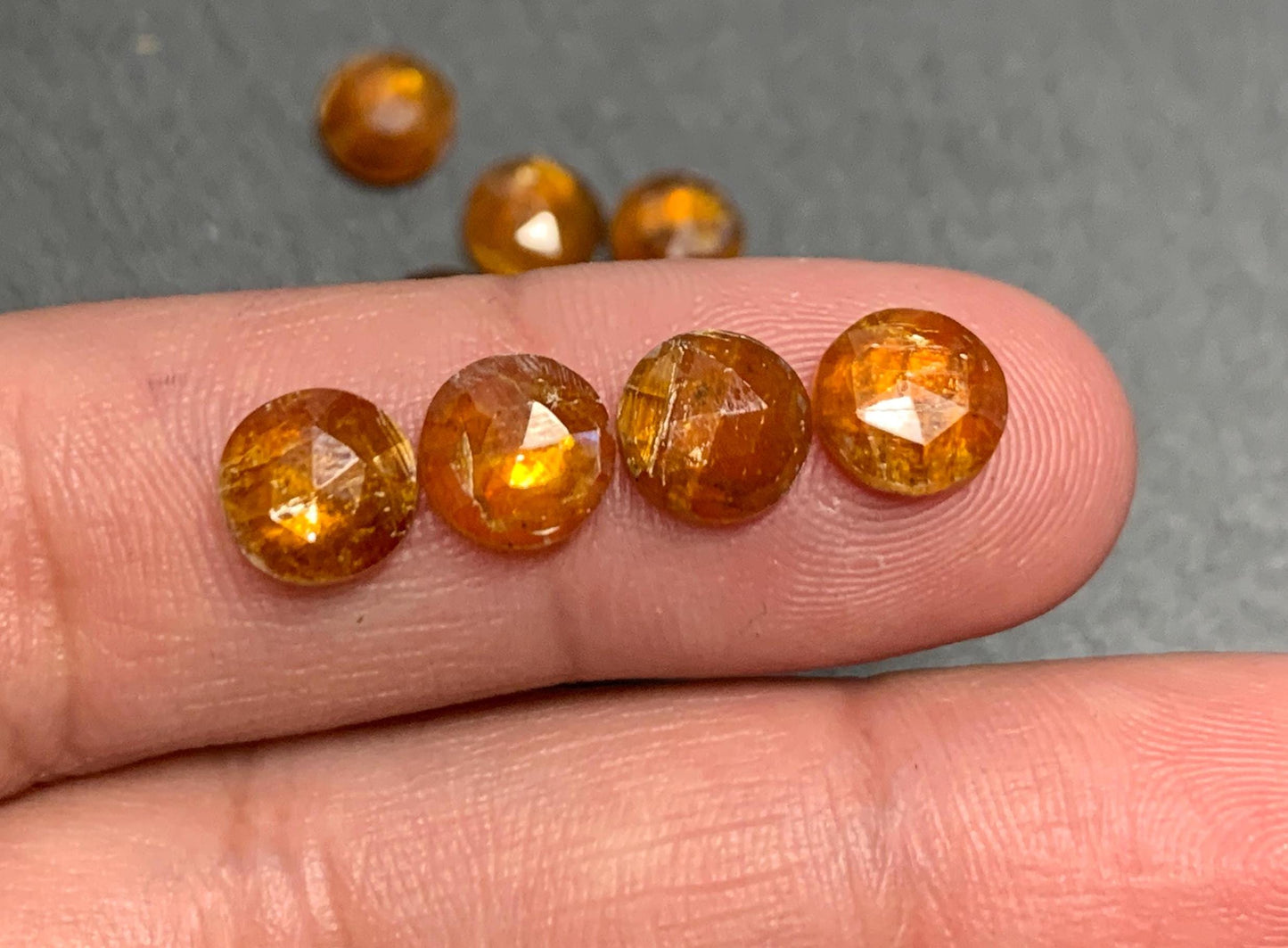 Damaged - faceted orange Kyanite round 7mm cabochons