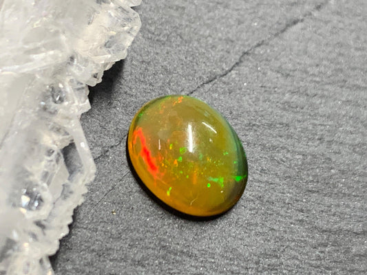 Natural Black Ethiopian Opal oval 9x11x4mm cabochon