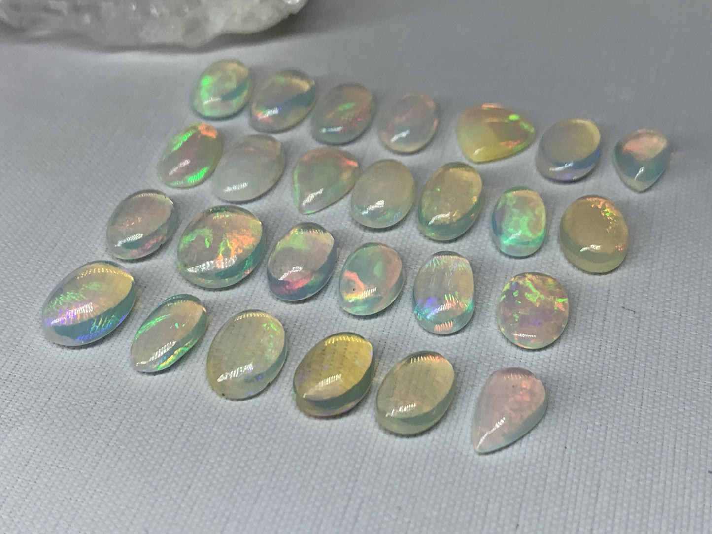 Ethiopian Opal 10-11mm long cabochon