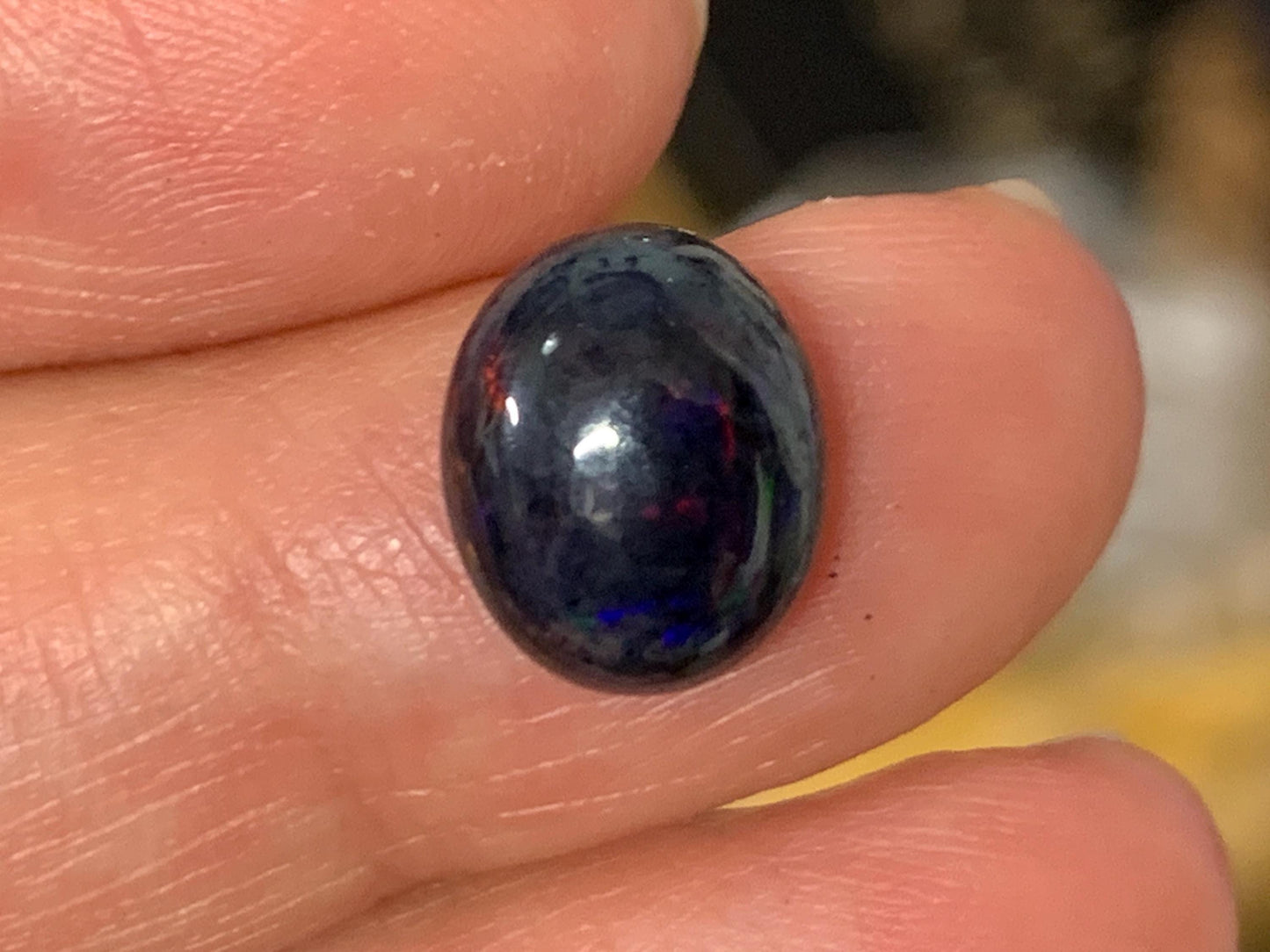 Black Ethiopian Opal 9x11x5mm cabochon