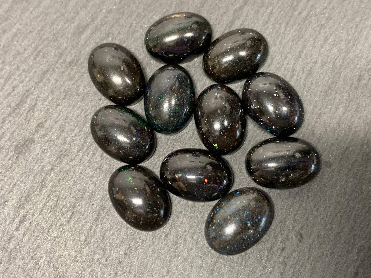 Black Andamooka Opal oval 10x14mm cabochon - Matrix Australian Opal