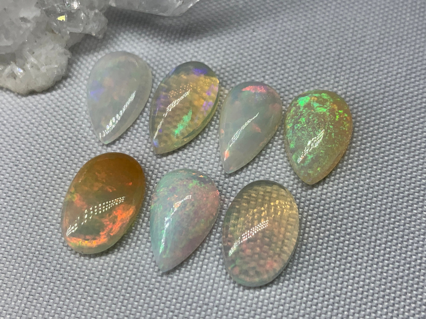Ethiopian Opal pear 13mm long cabochon