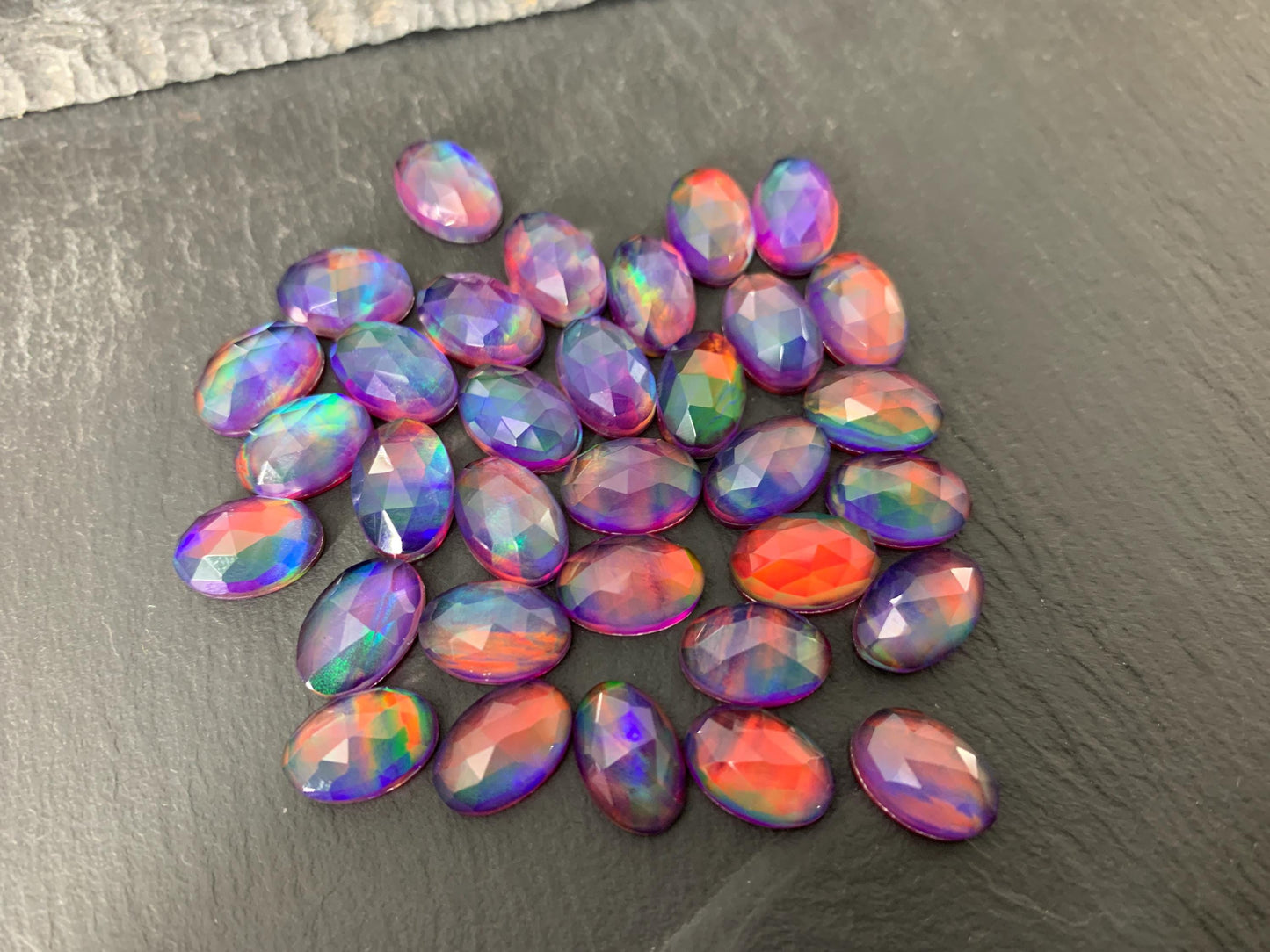 Faceted Aurora Opal oval 8x12mm cabochon - Doublet cabochons