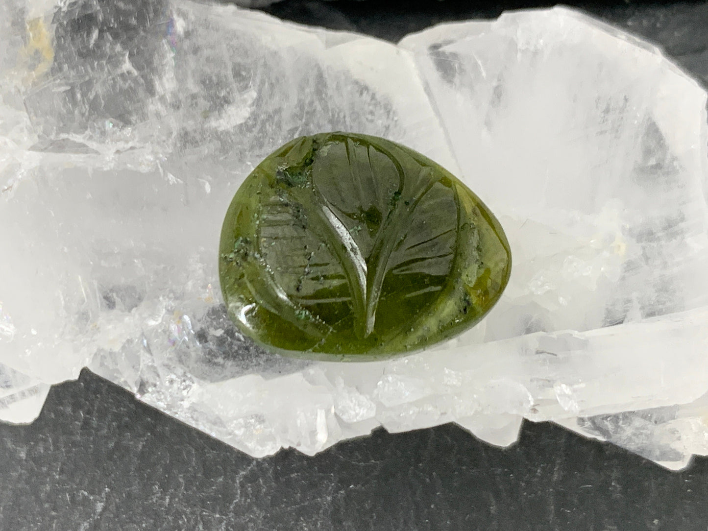 Carved Tourmaline 12x16x4mm cabochon