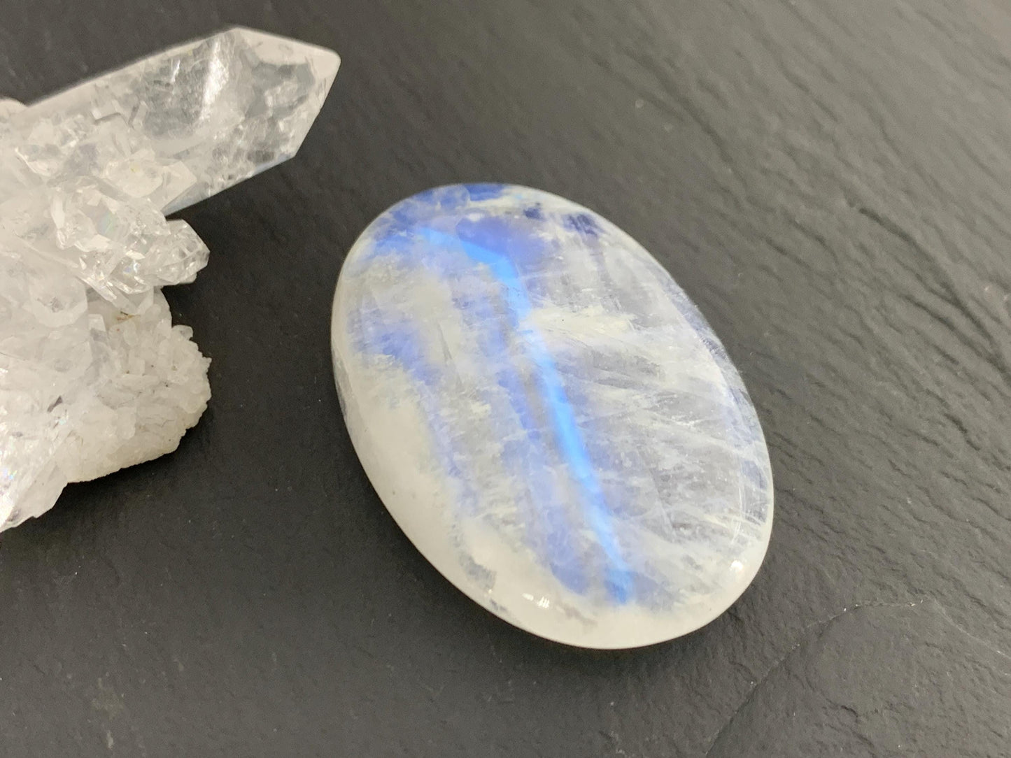 Rainbow Moonstone oval 35x24x9mm cabochon