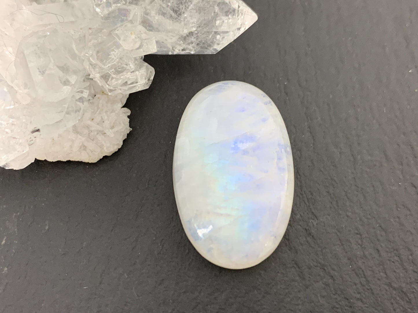 Rainbow Moonstone oval 25x16x8mm cabochon