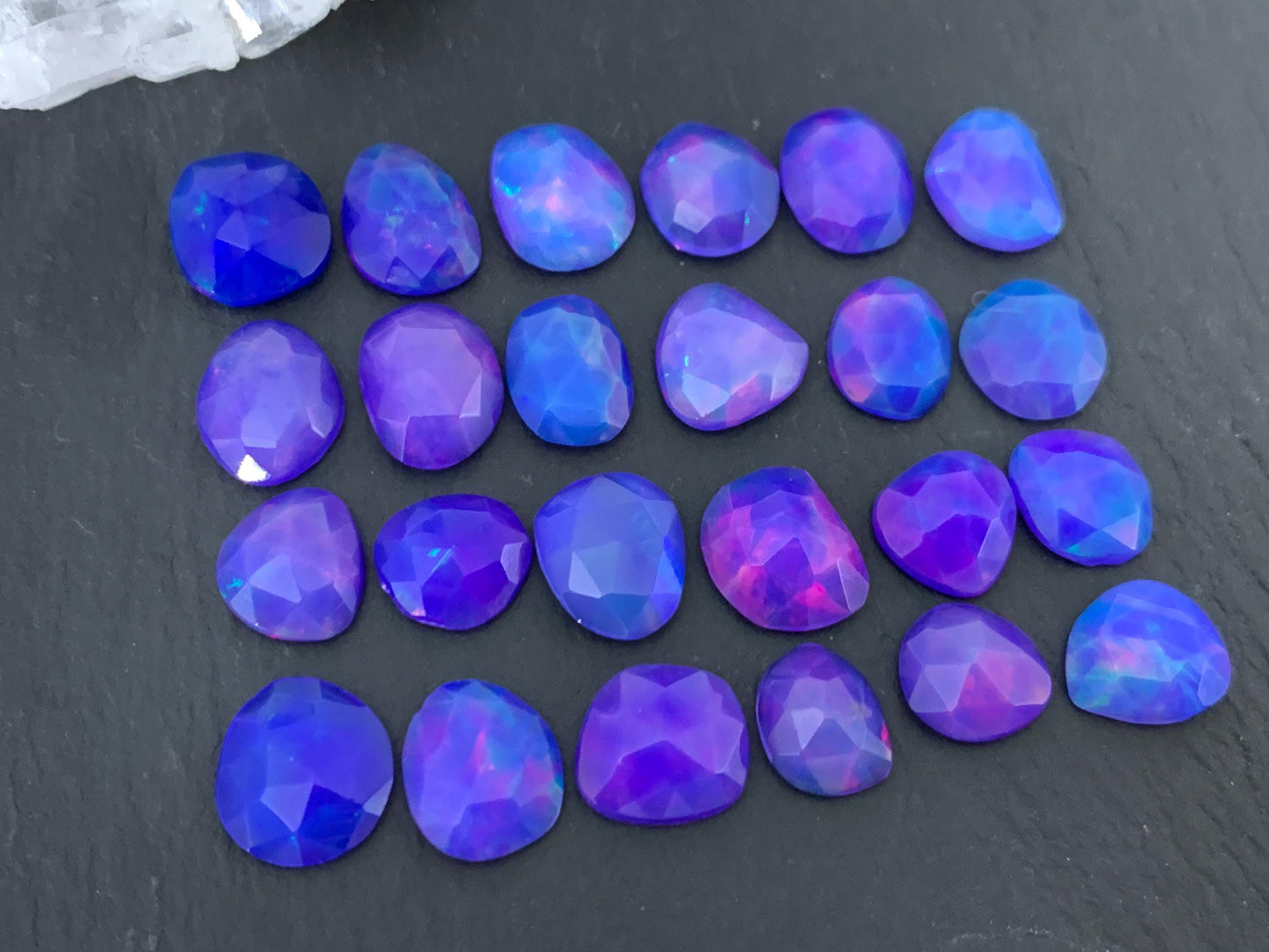 Faceted Purple Ethiopian Opal 8-10mm cabochon