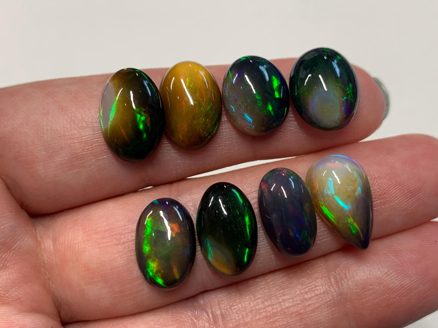 Natural Ethiopian Black Opal oval, pear 13-15mm long cabochon