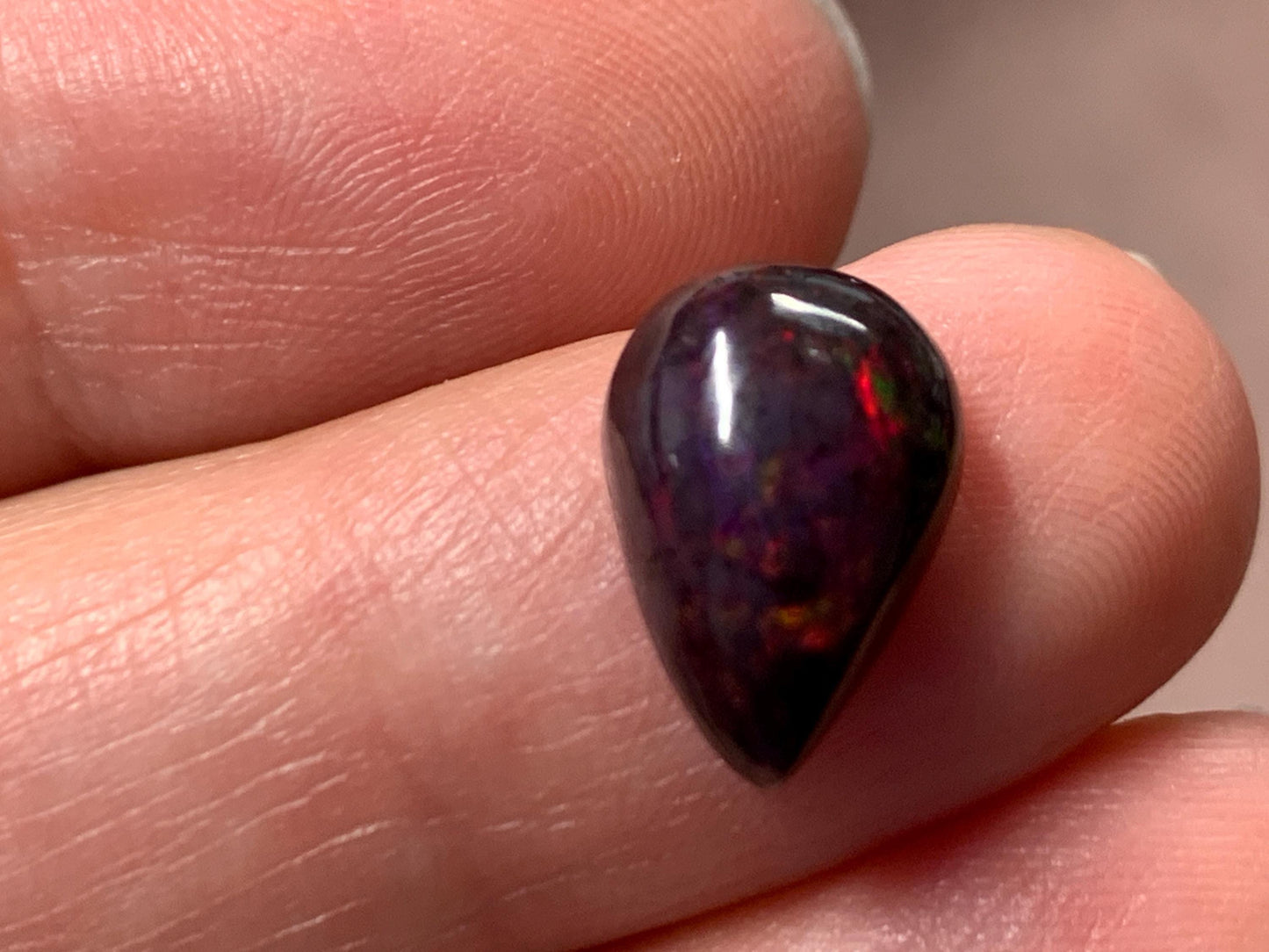Black Ethiopian Opal pear 9x12x5mm cabochon