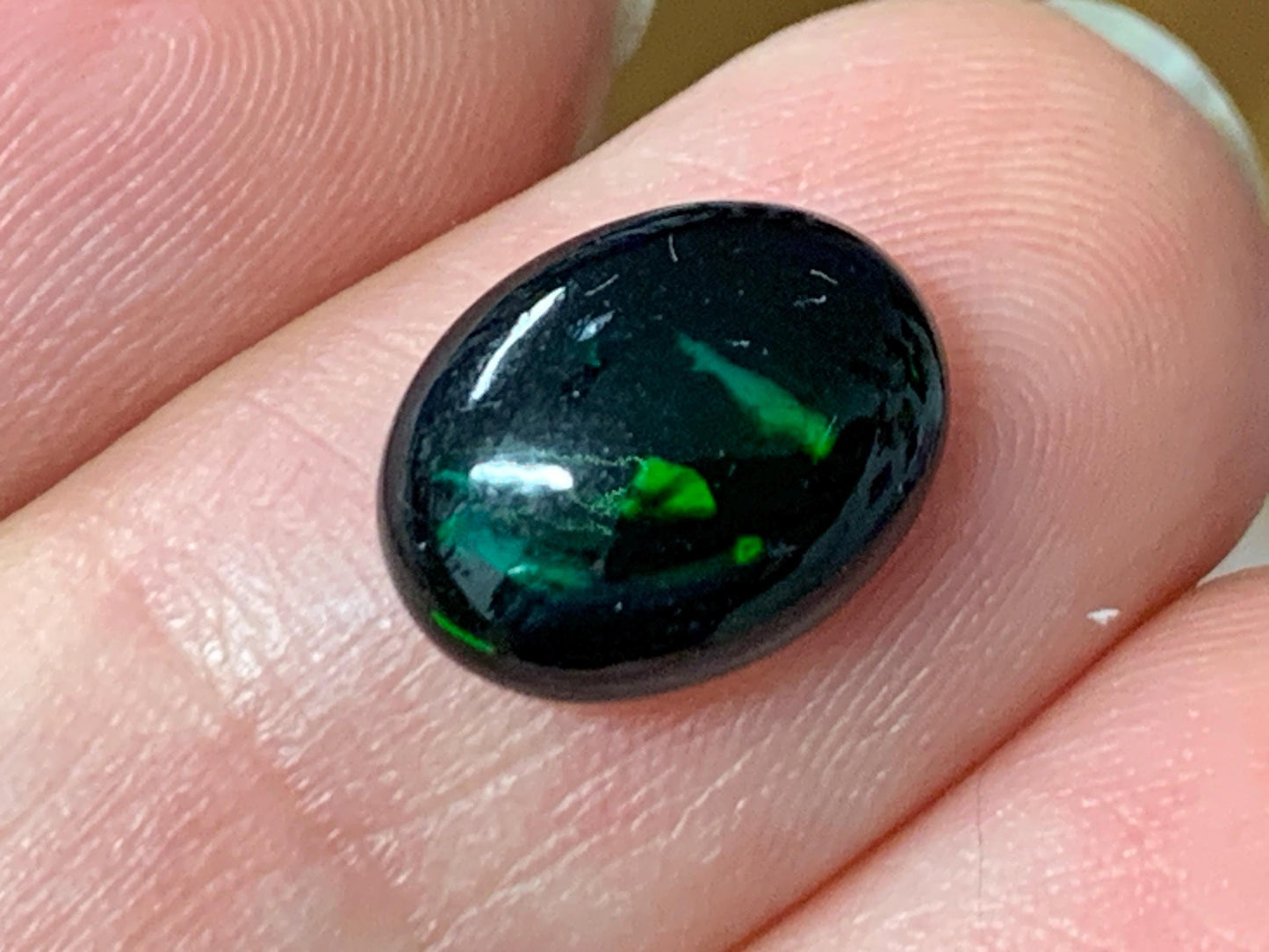 Natural Ethiopian Black Opal 8x11x3.5mm cabochon