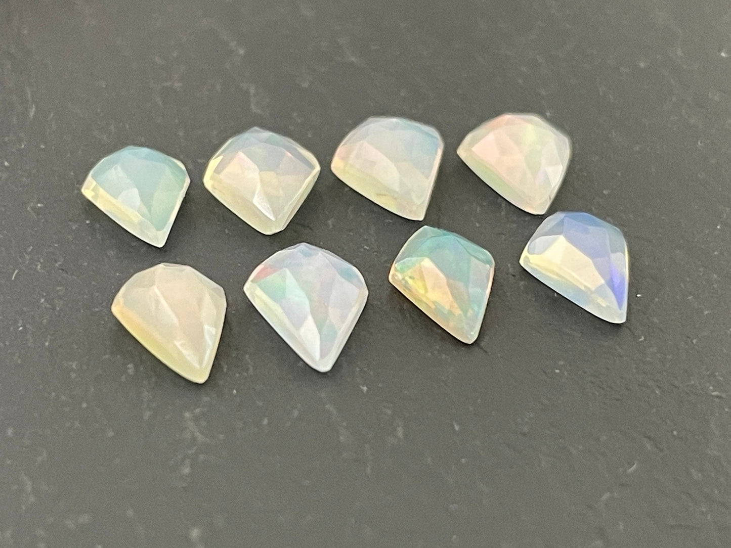 Faceted Ethiopian Opal kite 7.5-8.5mm long cabochon