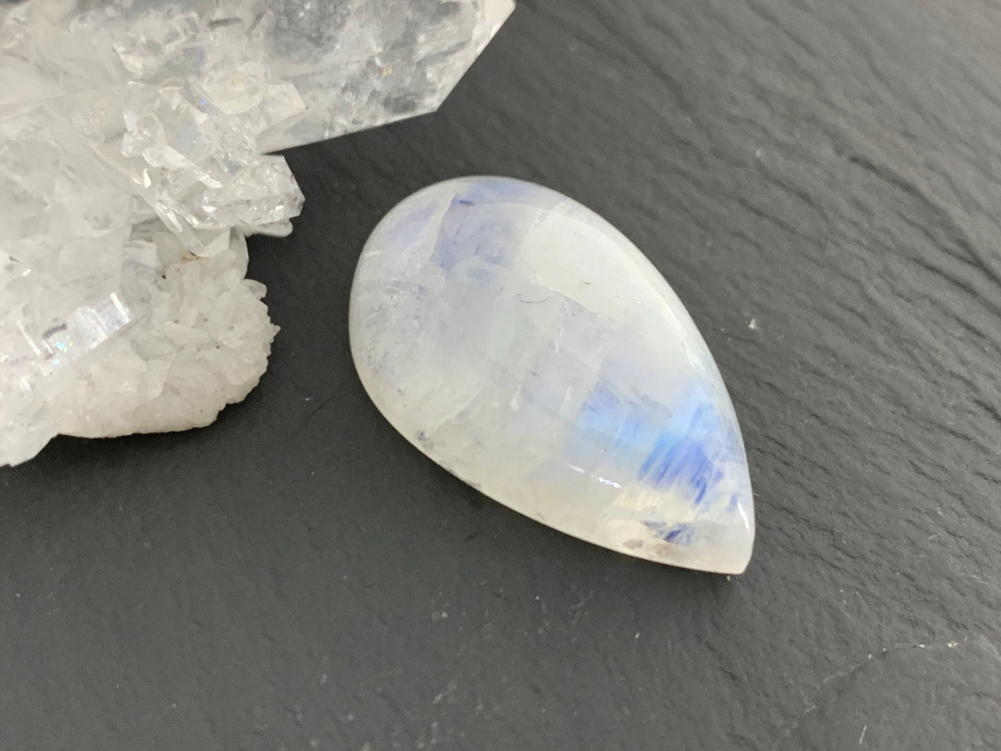 Rainbow Moonstone 26x16x8mm cabochon