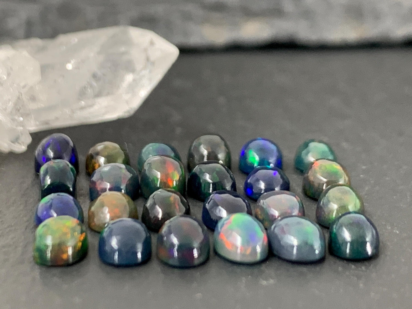 Black Ethiopian Opal oval 4x6mm cabochon
