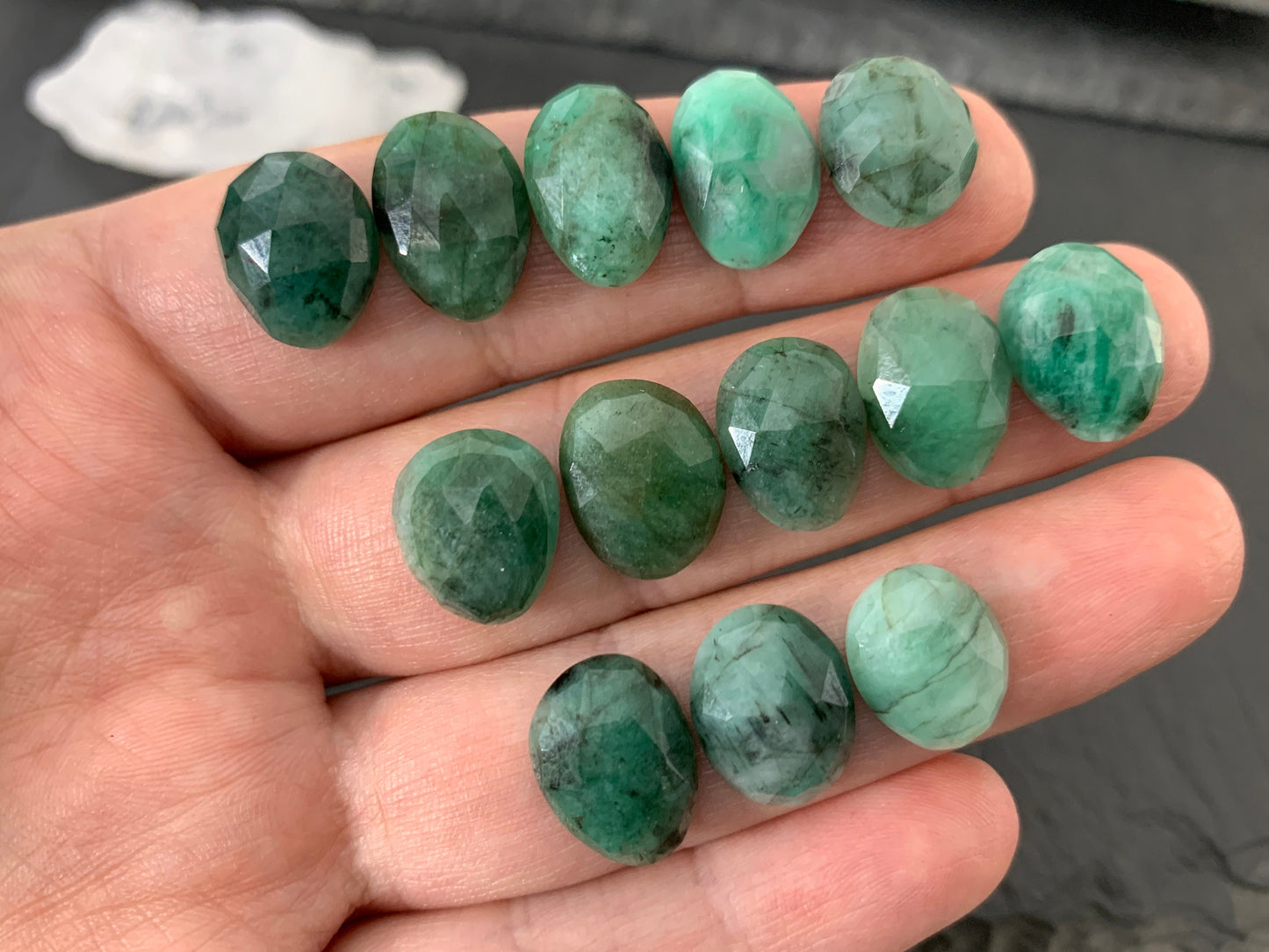Faceted Emerald oval 12-13mm cabochon