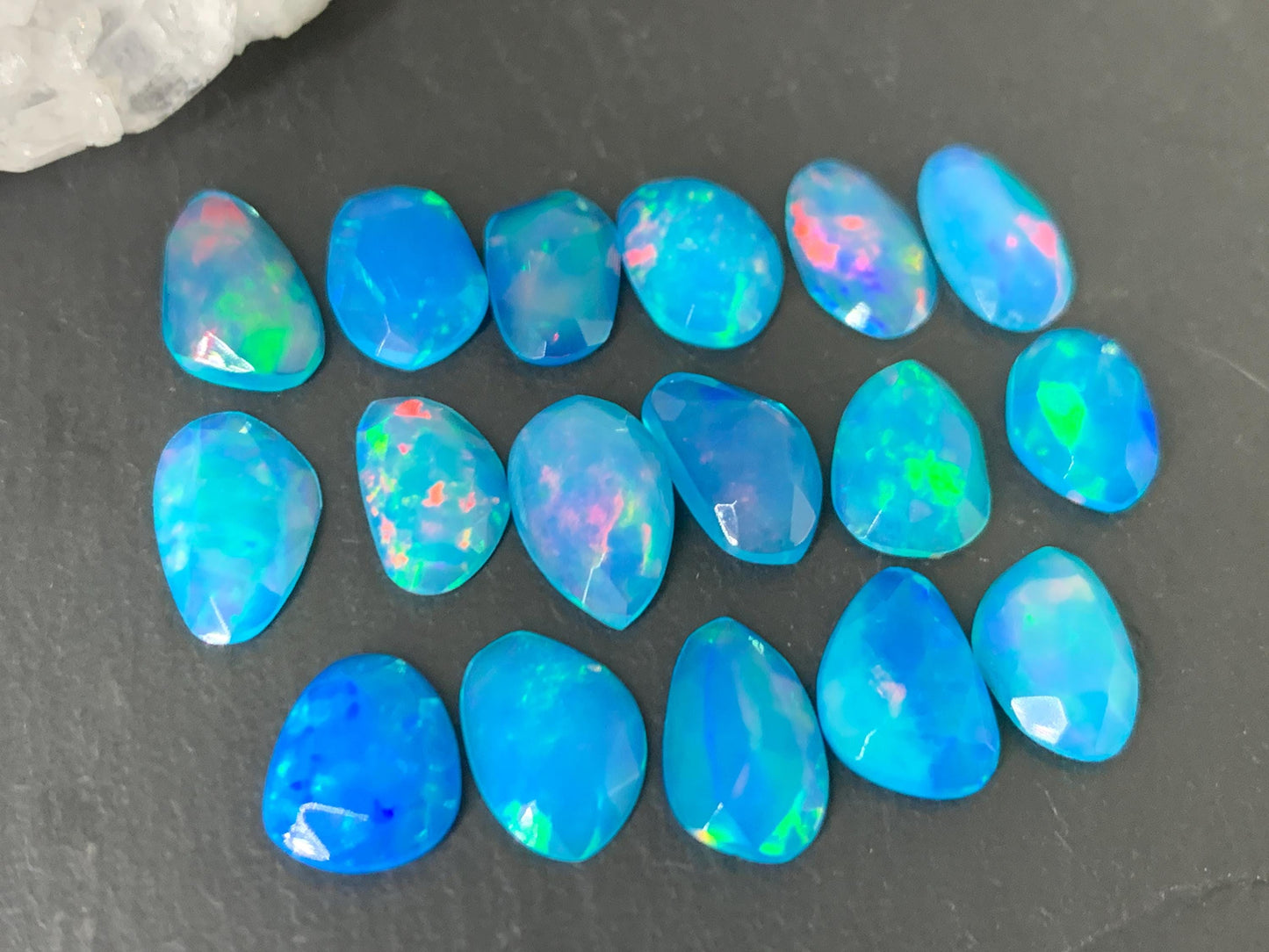 Faceted Blue Ethiopian Opal 9-10mm long cabochon