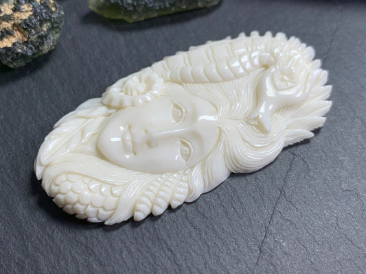 Bull Bone Carving - Woman with sea horse