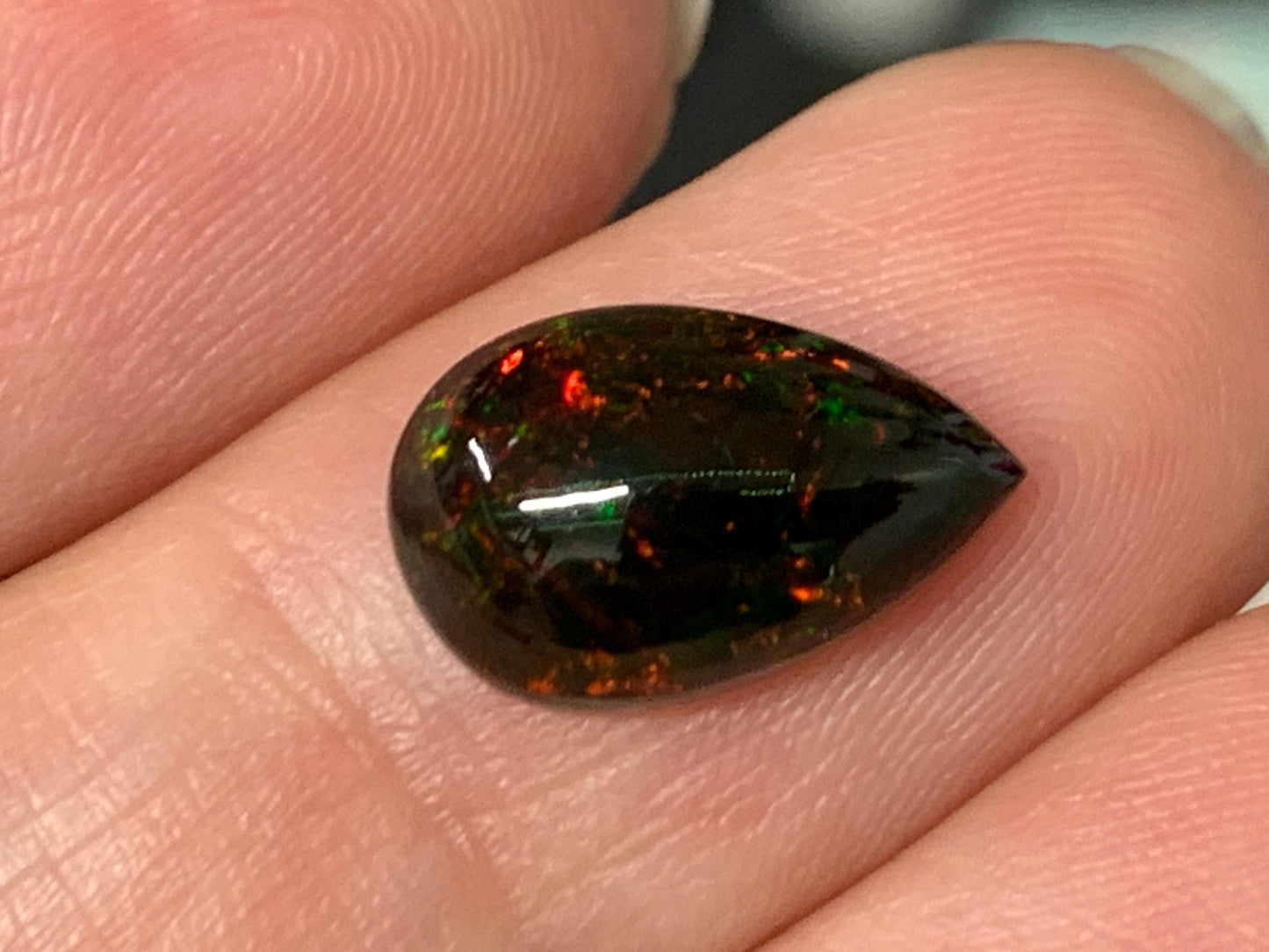 Natural Ethiopian Black Opal 8x12x4mm cabochon