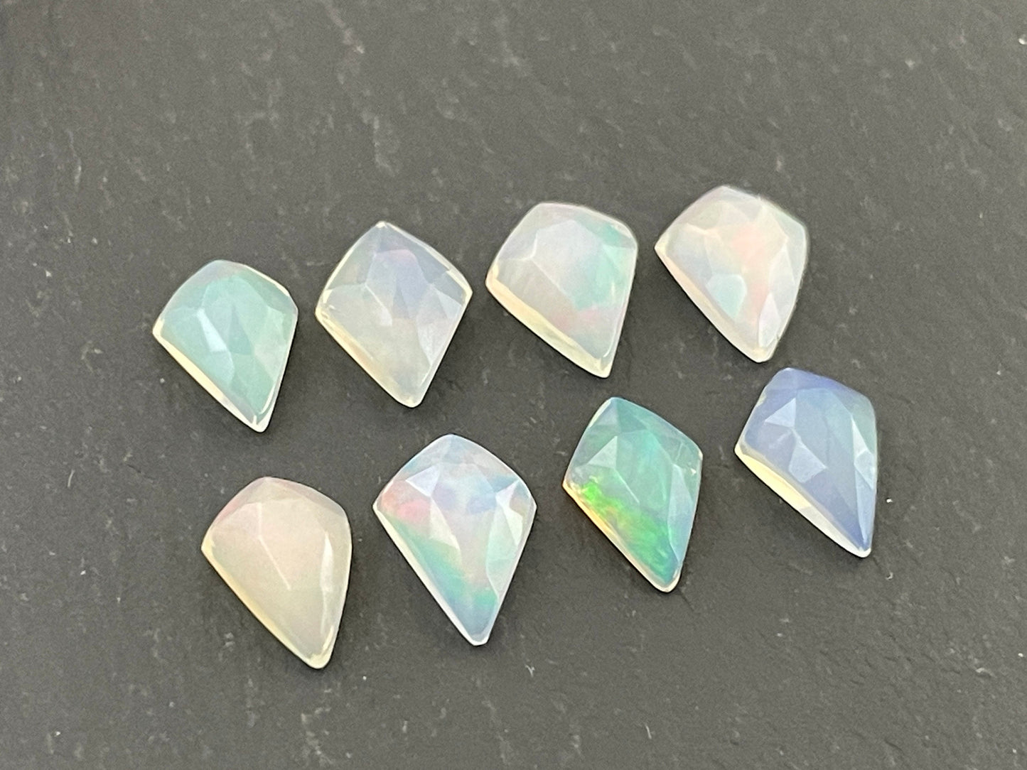 Faceted Ethiopian Opal kite 7.5-8.5mm long cabochon