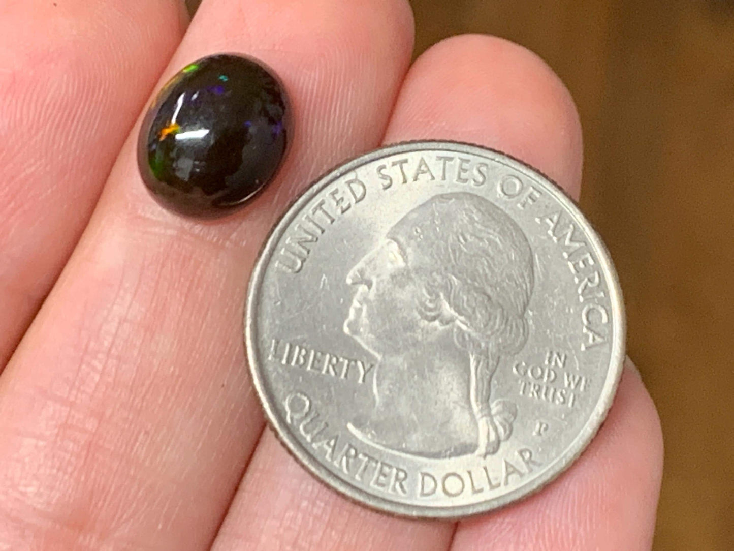 Natural Ethiopian Black Opal 9x11x5mm cabochon