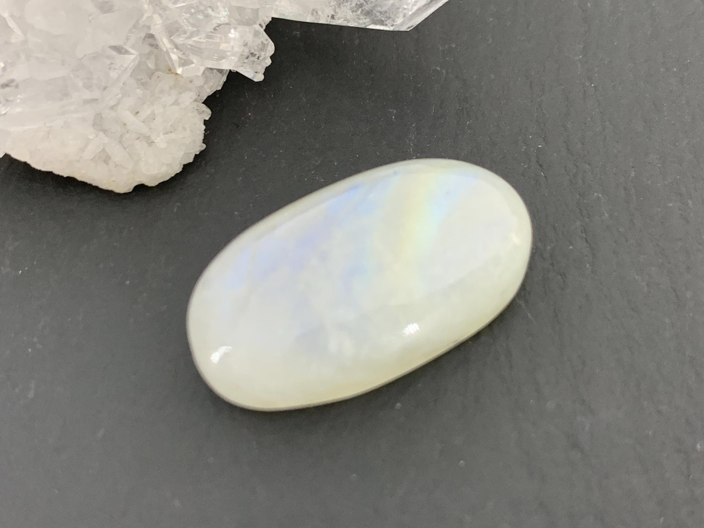 Rainbow Moonstone oval 23x12x7mm cabochon