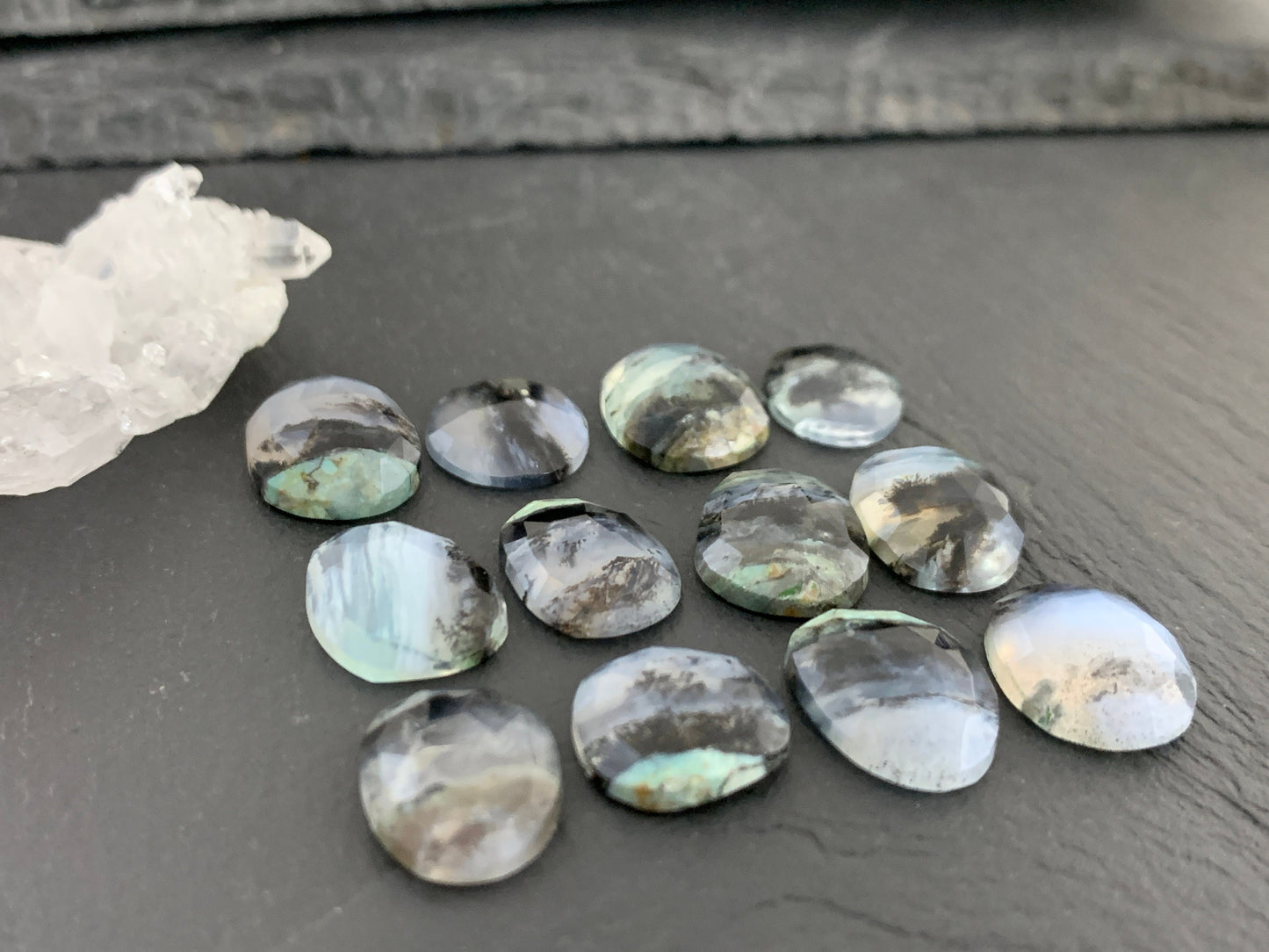 Faceted Peruvian Opal 13-15mm long cabochon