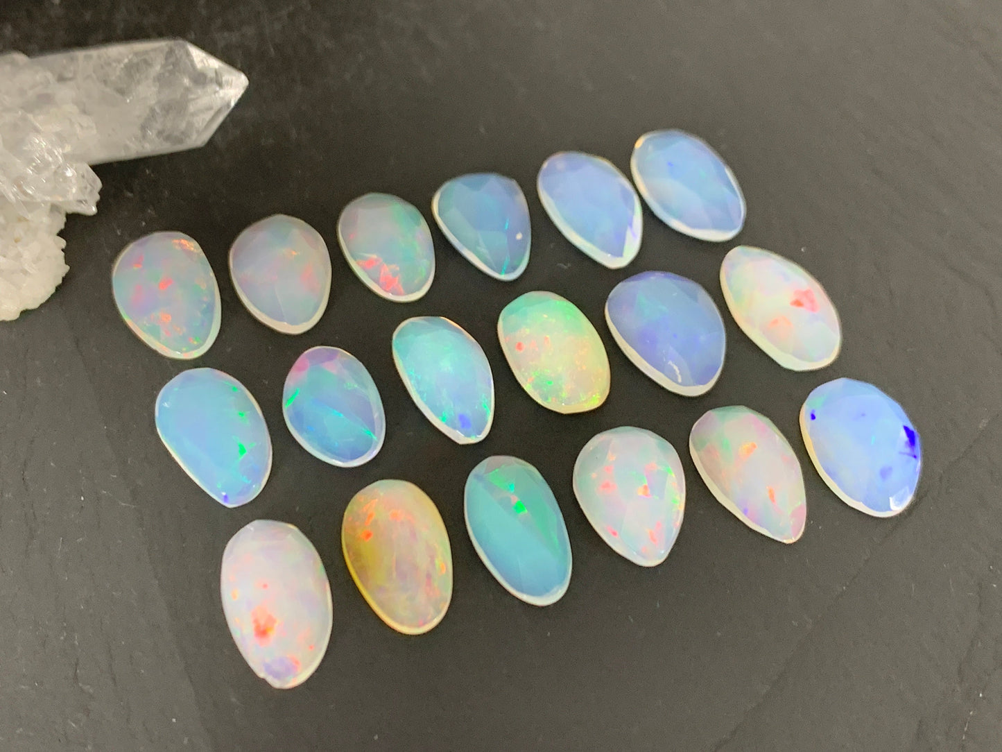 Faceted Ethiopian Opal oval 13mm cabochon