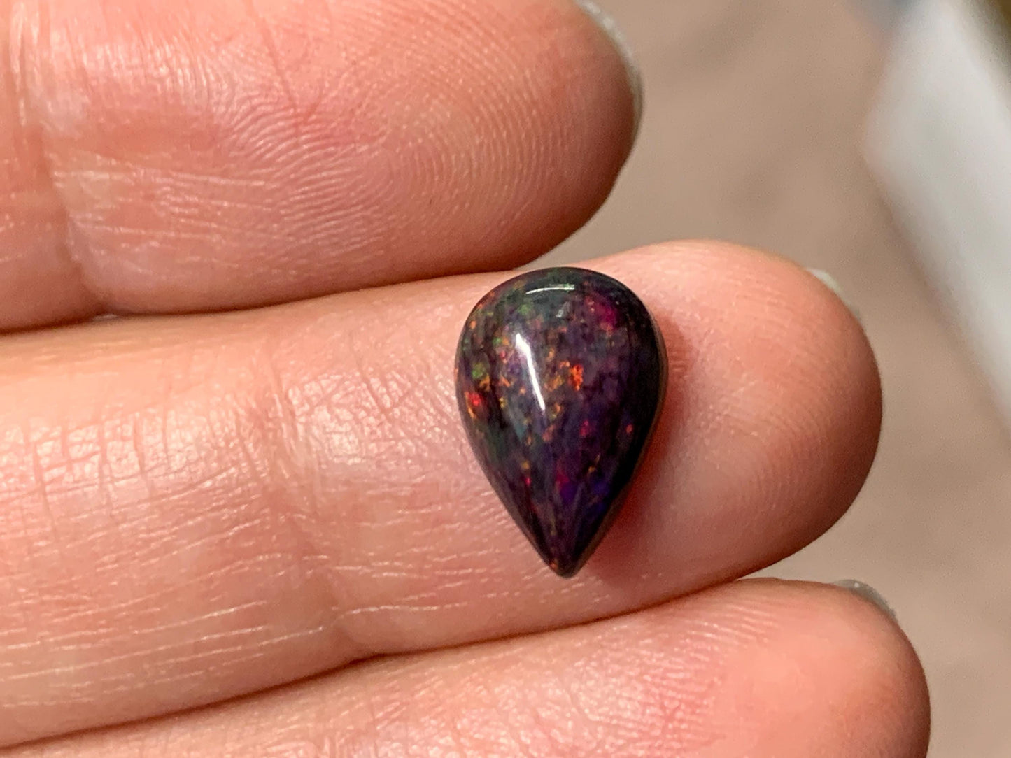 Black Ethiopian Opal pear 8x11x4mm cabochon