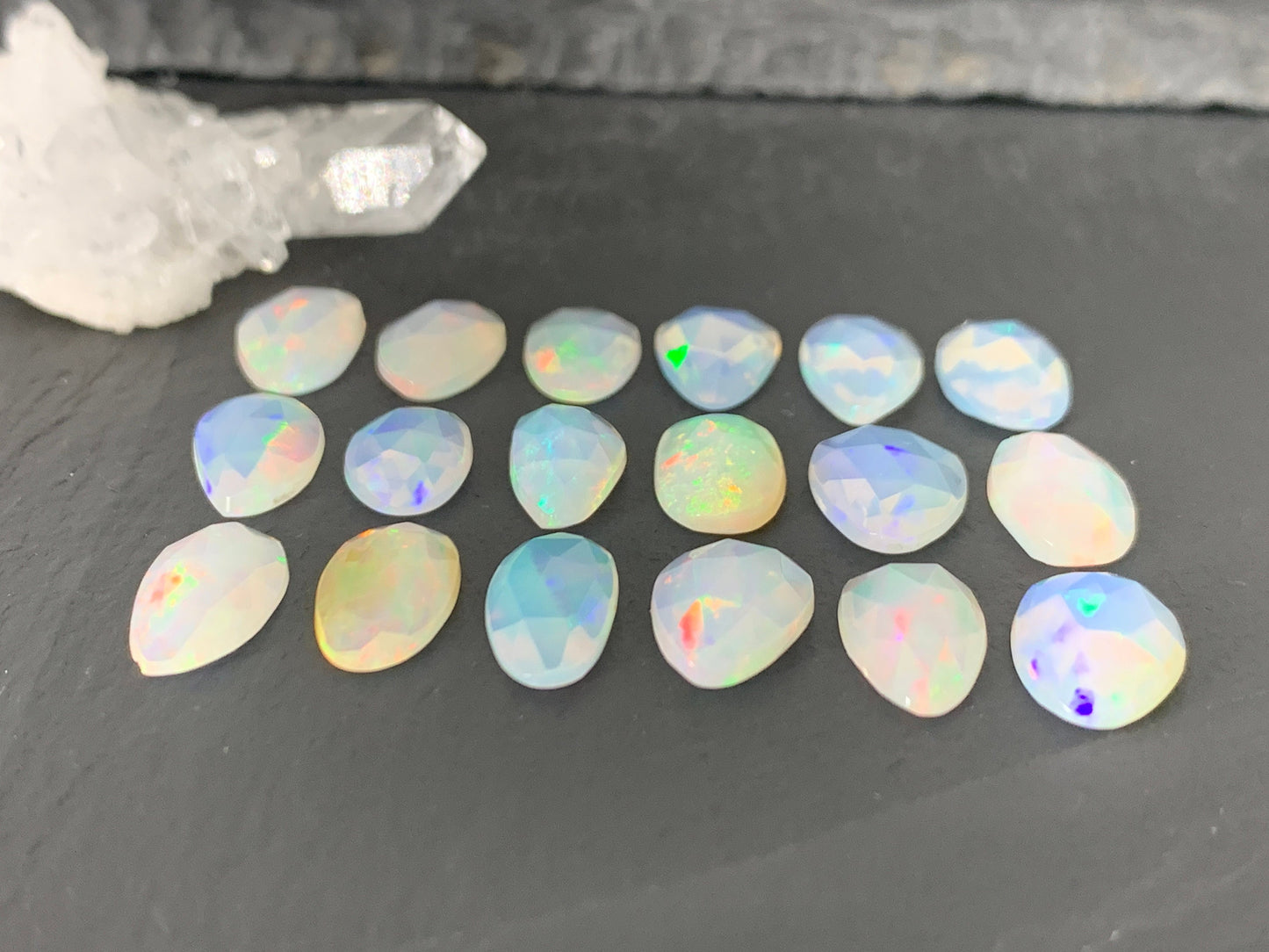 Faceted Ethiopian Opal oval 13mm cabochon