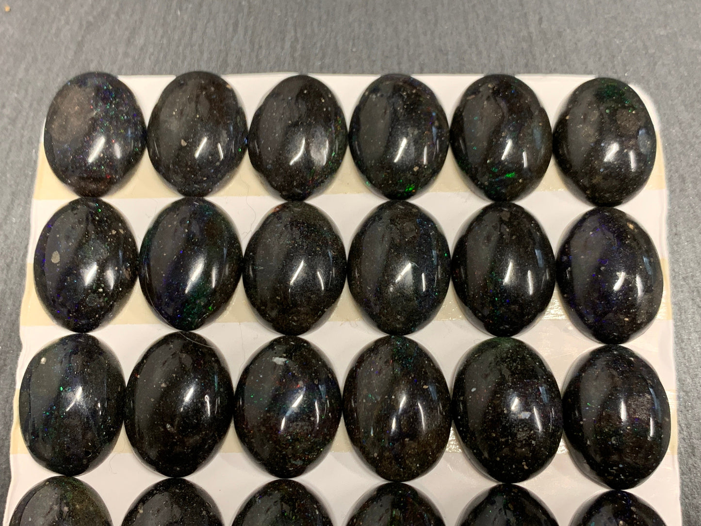 Black Andamooka Opal oval 10x14mm cabochon - Matrix Australian Opal