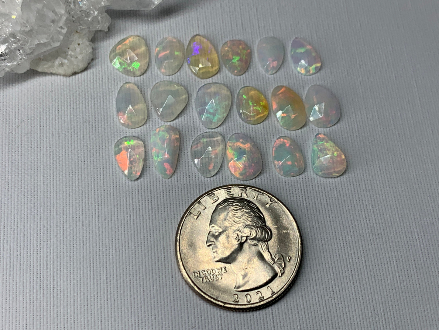 Faceted Ethiopian Opal 8-11mm long cabochon