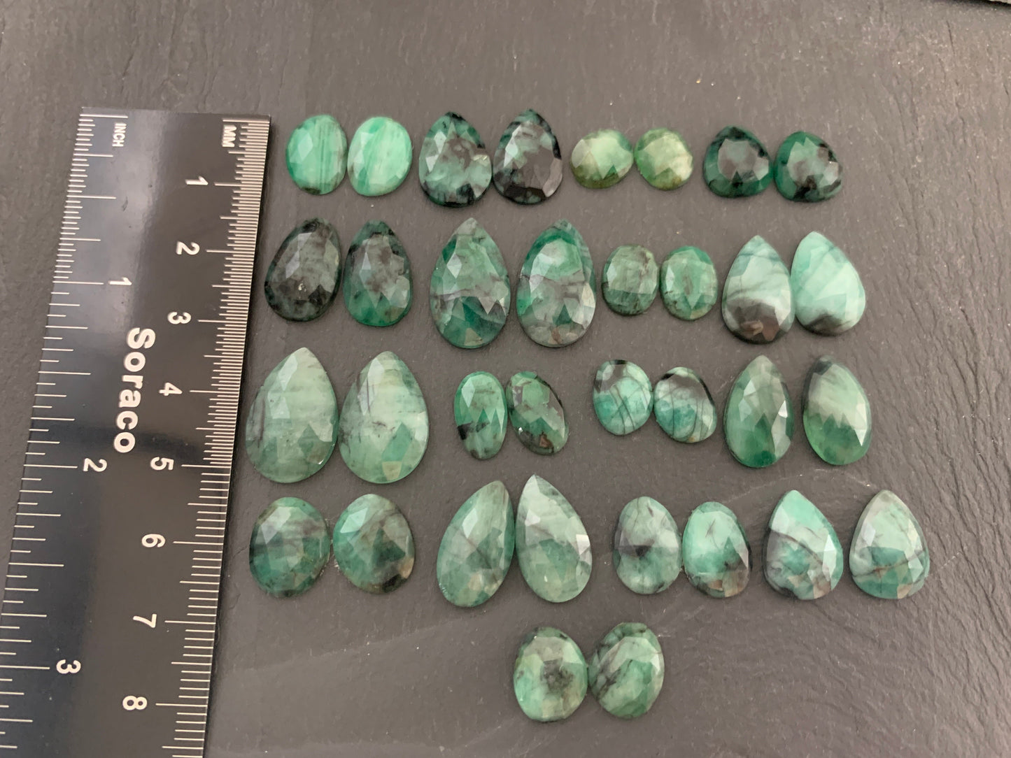 Faceted Emerald pair 9-19mm long cabochon