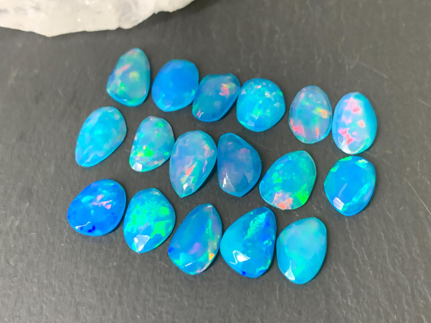 Faceted Blue Ethiopian Opal 9-10mm long cabochon