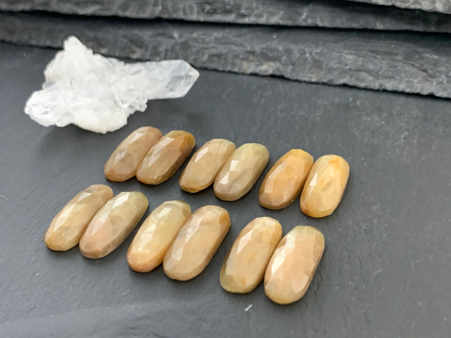 Pair of faceted Yellow Sapphire oval 8x20mm cabochon