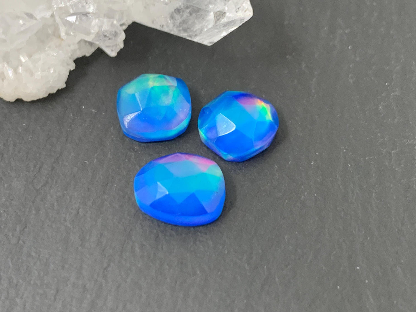 Faceted Aurora Opal free form 8-9mm long doublet cabochons