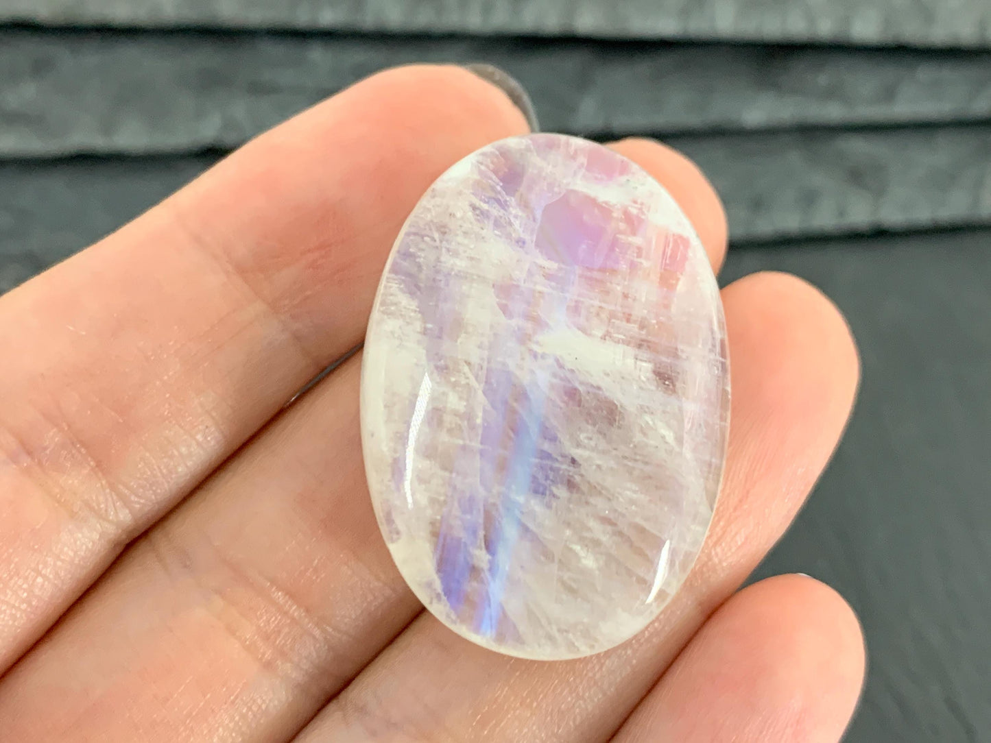 Rainbow Moonstone oval 35x24x9mm cabochon