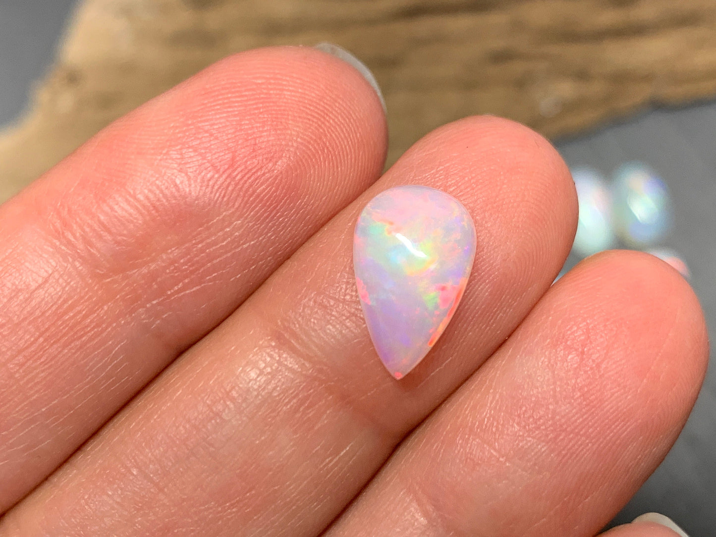 Ethiopian Opal 12-14mm long cabochon - pear, oval
