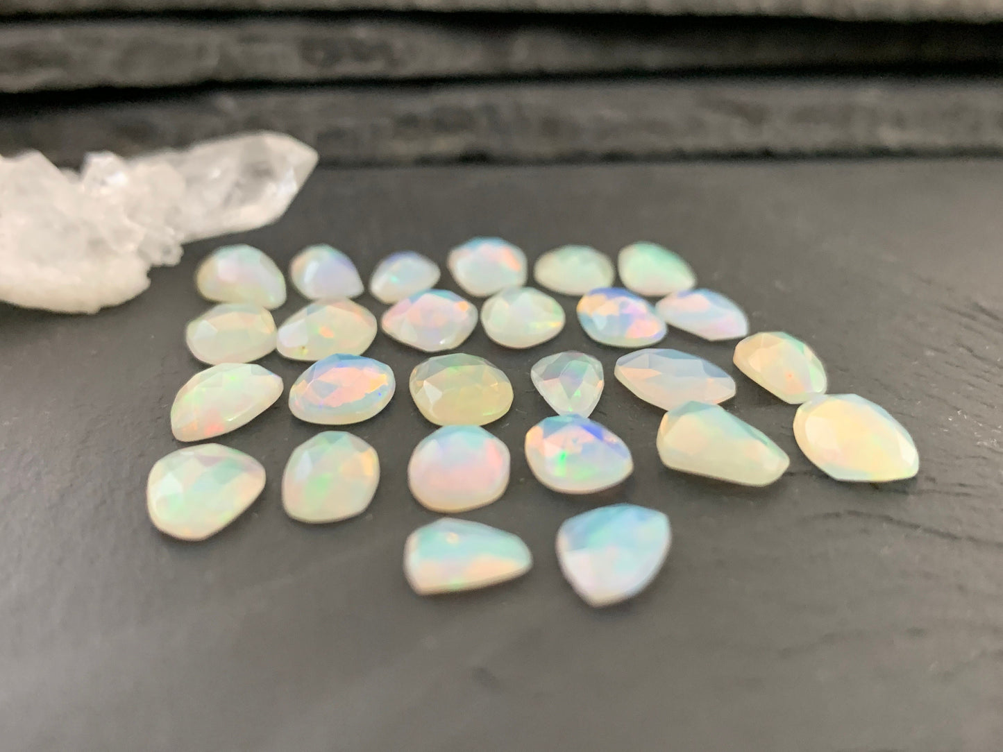 Faceted Ethiopian Opal 9-12mm long cabochon