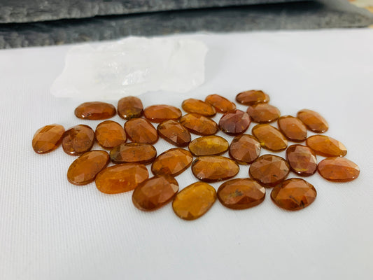 Faceted orange Kyanite oval 12-13mm long cabochons